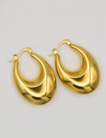 modern oval hoops trending in Canadian clean girl fashion