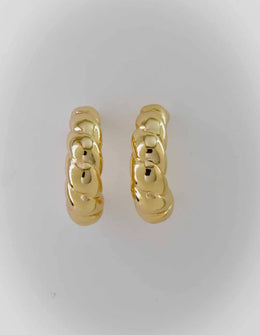 Bold twisted gold earrings with high-polish shine


