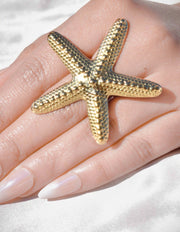 Starfish_Serenity_resizeable_Ring_for_girls_in_canada_gold_detailed_on_finger_webp