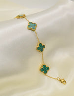 elegant_goden_clover_bracelet_with_green_stone_links_montreal_jewelry_store