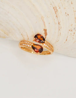 indian rings canada golden flame teardrop ring with double pear-cut gemstones on gold band montreal minimalist jewelry