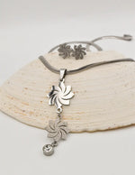 circle swirl silver pendant necklace with matching stud earrings canada jewellery